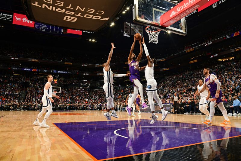 PHOENIX, AZ - JANUARY  7: Kevin Durant #35 of the Phoenix Suns shoots the ball during the game against the Memphis Grizzlies on January 7, 2024 at Footprint Center in Phoenix, Arizona. NOTE TO USER: User expressly acknowledges and agrees that, by downloading and or using this photograph, user is consenting to the terms and conditions of the Getty Images License Agreement. Mandatory Copyright Notice: Copyright 2024 NBAE (Photo by Kate Frese/NBAE via Getty Images)