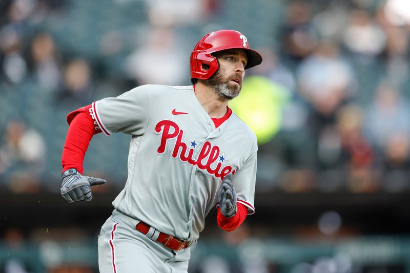 Apr 18, 2023; Chicago, Illinois, USA; Philadelphia Phillies left fielder Jake Cave (44) runs to first base after hitting a single against the Chicago White Sox during the seventh inning of game one of the doubleheader at Guaranteed Rate Field. Mandatory Credit: Kamil Krzaczynski-USA TODAY Sports