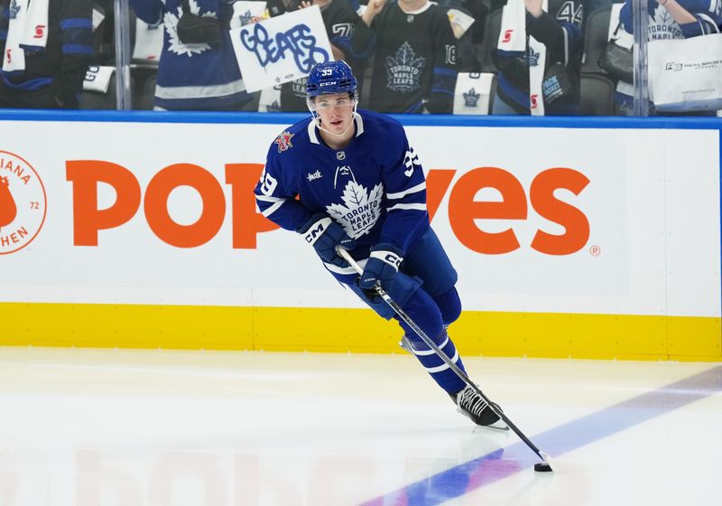 Oct 11, 2023; Toronto, Ontario, CAN; Toronto Maple Leafs center Fraser Minten (39) skates during the warm up before game against the Montreal Canadiens at Scotiabank Arena. Mandatory Credit: Nick Turchiaro-USA TODAY Sports