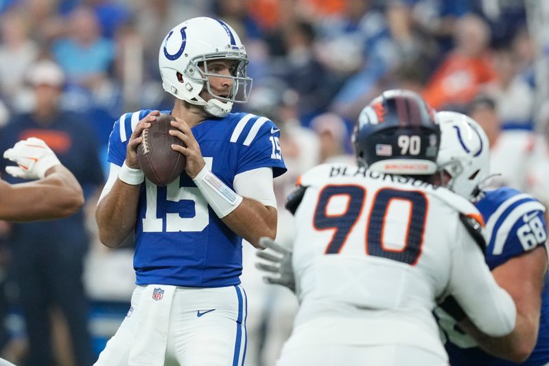 Indianapolis Colts quarterback Joe Flacco (15) steps back to pass against the Denver Broncos during the second quarter of a preseason NFL football game, Sunday, Aug. 11, 2024, in Westfield, Ind. (AP Photo/Darron Cummings)