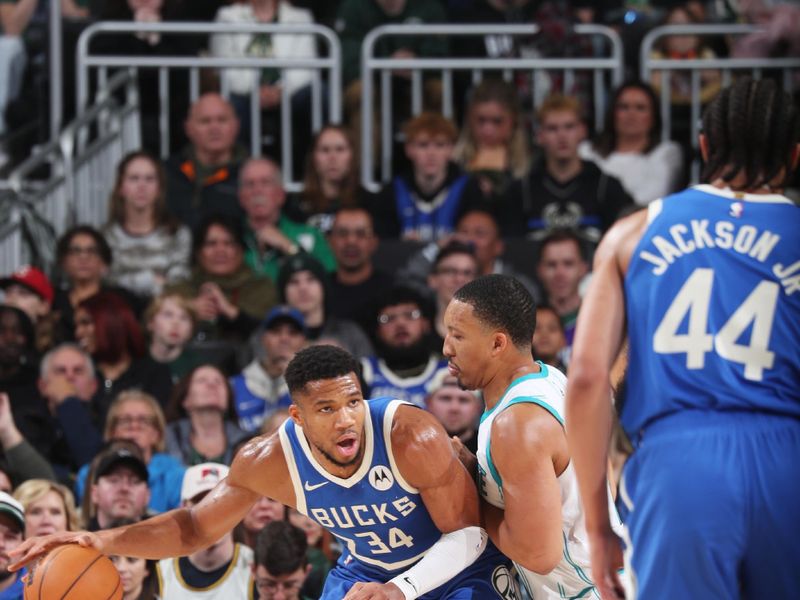 MILWAUKEE, WI - NOVEMBER 23: Giannis Antetokounmpo #34 of the Milwaukee Bucks dribbles the ball during the game against the Charlotte Hornets on November 23, 2024 at the Fiserv Forum Center in Milwaukee, Wisconsin. NOTE TO USER: User expressly acknowledges and agrees that, by downloading and or using this Photograph, user is consenting to the terms and conditions of the Getty Images License Agreement. Mandatory Copyright Notice: Copyright 2024 NBAE (Photo by Gary Dineen/NBAE via Getty Images).