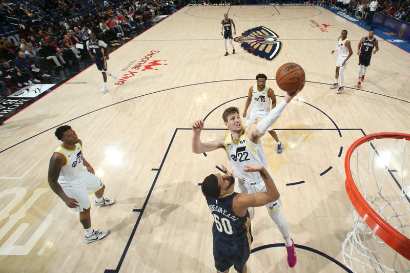 NEW ORLEANS, LA - JANUARY 17:  Kyle Filipowski #22 of the Utah Jazz drives to the basket during the game against the New Orleans Pelicans on January 17, 2025 at the Smoothie King Center in New Orleans, Louisiana. NOTE TO USER: User expressly acknowledges and agrees that, by downloading and or using this Photograph, user is consenting to the terms and conditions of the Getty Images License Agreement. Mandatory Copyright Notice: Copyright 2025 NBAE (Photo by Layne Murdoch Jr./NBAE via Getty Images)