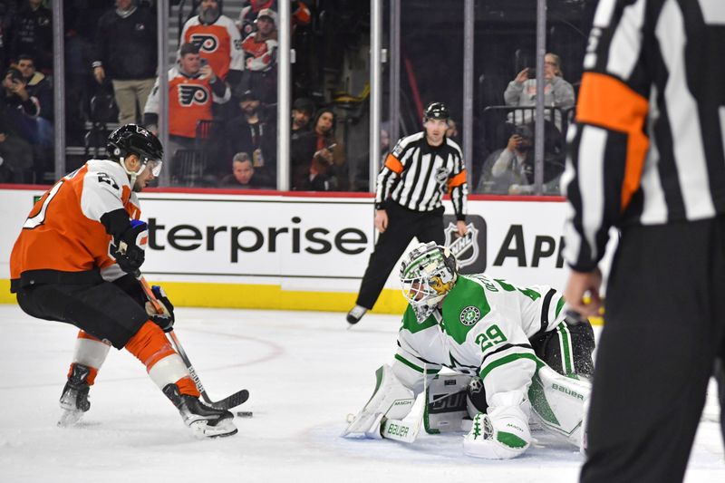 Jan 18, 2024; Philadelphia, Pennsylvania, USA; Philadelphia Flyers center Scott Laughton (21) scores a goal on a penalty shot against Dallas Stars goaltender Jake Oettinger (29) during the third period at Wells Fargo Center. Mandatory Credit: Eric Hartline-USA TODAY Sports