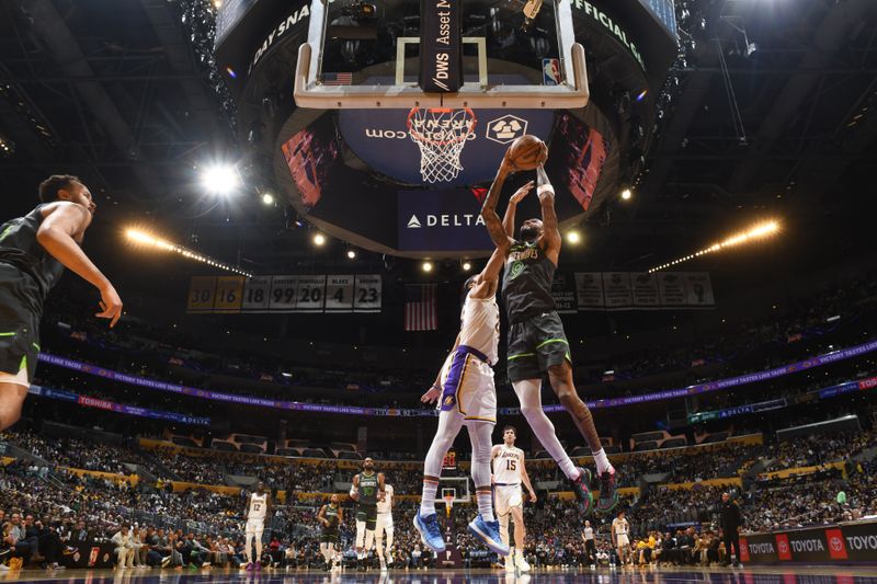 LOS ANGELES, CA - APRIL 7: Nickeil Alexander-Walker #9 of the Minnesota Timberwolves drives to the basket during the game against the Los Angeles Lakers on April 7, 2024 at Crypto.Com Arena in Los Angeles, California. NOTE TO USER: User expressly acknowledges and agrees that, by downloading and/or using this Photograph, user is consenting to the terms and conditions of the Getty Images License Agreement. Mandatory Copyright Notice: Copyright 2024 NBAE (Photo by Juan Ocampo/NBAE via Getty Images)