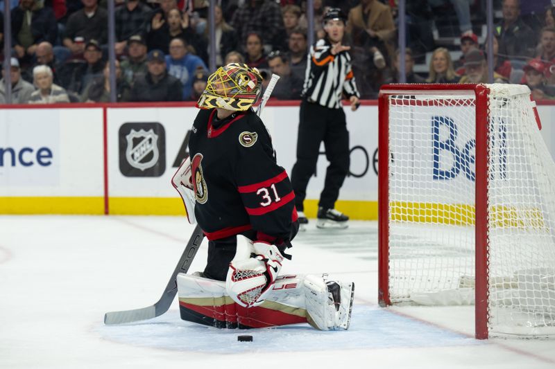 Nov 7, 2024; Ottawa, Ontario, CAN; Ottawa Senators goalie Anton Forsberg (31) reacts to a goal scored in the second period against the New York Islanders  at the Canadian Tire Centre. Mandatory Credit: Marc DesRosiers-Imagn Images