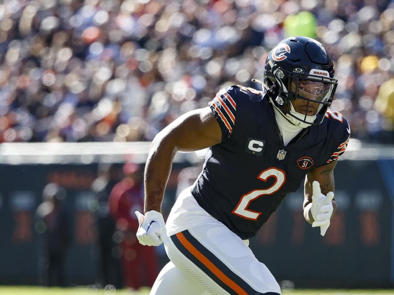 Chicago Bears wide receiver DJ Moore (2) runs on the field during the first half of an NFL football game against the Las Vegas Raiders, Sunday, Oct. 22, 2023, in Chicago. (AP Photo/Kamil Krzaczynski)