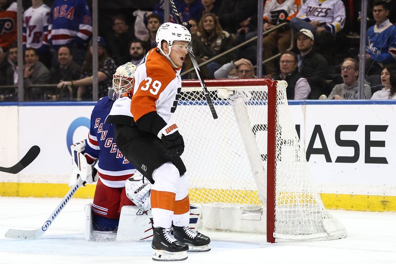Feb 26, 2026; New York, New York, USA;  Philadelphia Flyers right wing Matvei Michkov (39) celebrates after scoring a the game winning goal in overtime against the New York Rangers at Madison Square Garden. Mandatory Credit: Wendell Cruz-Imagn Images