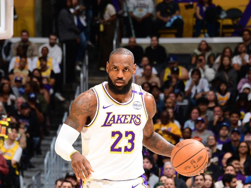 LOS ANGELES, CA - OCTOBER 26: LeBron James #23 of the Los Angeles Lakers dribbles the ball during the game against the Sacramento Kings on October 26, 2024 at Crypto.Com Arena in Los Angeles, California. NOTE TO USER: User expressly acknowledges and agrees that, by downloading and/or using this Photograph, user is consenting to the terms and conditions of the Getty Images License Agreement. Mandatory Copyright Notice: Copyright 2024 NBAE (Photo by Adam Pantozzi/NBAE via Getty Images)