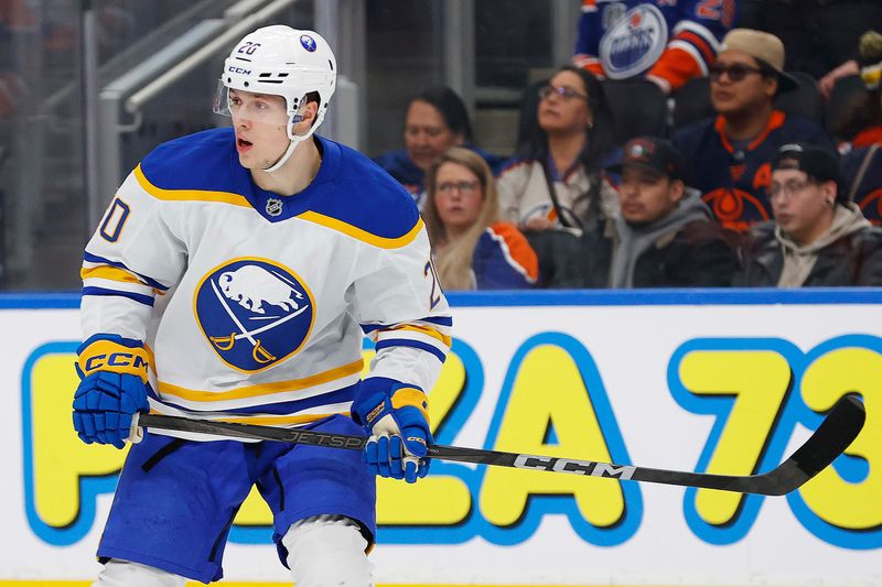 Jan 25, 2025; Edmonton, Alberta, CAN; Buffalo Sabres forward Jiri Kulich (20) looks for a loose puck against the Edmonton Oilers at Rogers Place. Mandatory Credit: Perry Nelson-Imagn Images