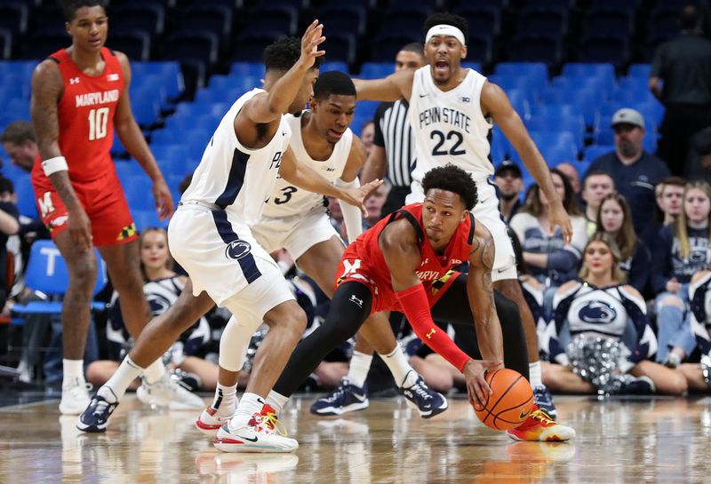 Mar 5, 2023; University Park, Pennsylvania, USA;  Maryland Terrapins guard Jahmir Young (1) picks up a loose ball as Penn State Nittany Lions guard Camren Wynter (11) and forward Kebba Njie (3) defend during the first half at Bryce Jordan Center. Mandatory Credit: Matthew OHaren-USA TODAY Sports