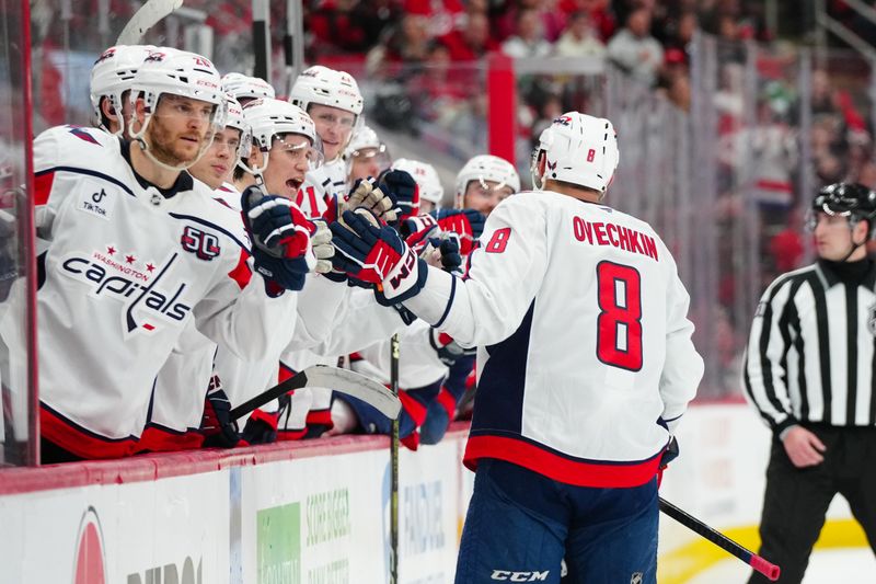 Apr 2, 2025; Raleigh, North Carolina, USA;  Washington Capitals left wing Alex Ovechkin (8) clebrates his goal against the Carolina Hurricanes during the second period at Lenovo Center. Mandatory Credit: James Guillory-Imagn Images