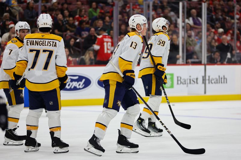 Nov 7, 2024; Sunrise, Florida, USA; Nashville Predators center Juuso Parssinen (13) looks on after scoring against the Florida Panthers during the third period at Amerant Bank Arena. Mandatory Credit: Sam Navarro-Imagn Images