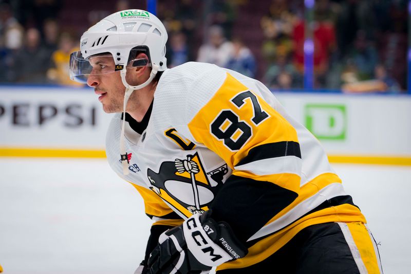 Feb 27, 2024; Vancouver, British Columbia, CAN; Pittsburgh Penguins forward Sidney Crosby (87) skates during warm up prior to a game against the Vancouver Canucks at Rogers Arena. Mandatory Credit: Bob Frid-USA TODAY Sports