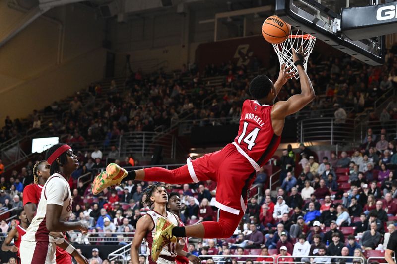 Feb 11, 2023; Chestnut Hill, Massachusetts, USA; North Carolina State Wolfpack guard Casey Morsell (14) attempts a layup against the Boston College Eagles during the second half at the Conte Forum. Mandatory Credit: Brian Fluharty-USA TODAY Sports