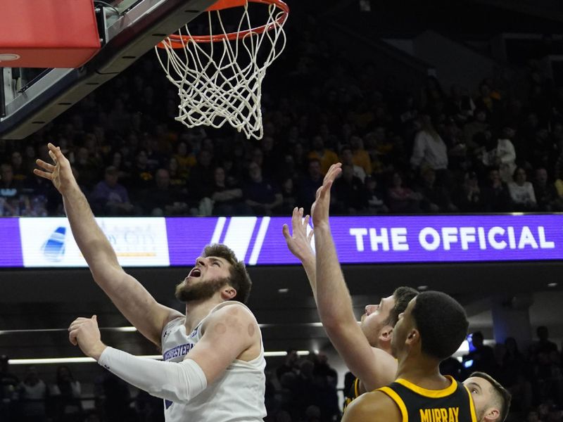 Feb 19, 2023; Evanston, Illinois, USA; Northwestern Wildcats center Matthew Nicholson (34) is defended by Iowa Hawkeyes forward Kris Murray (24) during the second half at Welsh-Ryan Arena. Mandatory Credit: David Banks-USA TODAY Sports