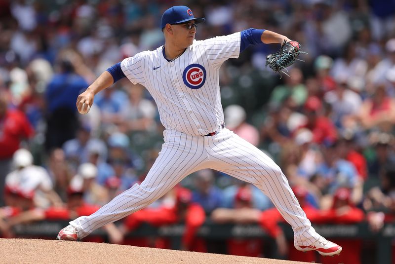 May 31, 2024; Chicago, Illinois, USA; Chicago Cubs pitcher Javier Assad (72) delivers a pitch during the first inning against the Cincinnati Reds at Wrigley Field. Mandatory Credit: Melissa Tamez-USA TODAY Sports