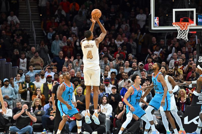 CLEVELAND, OHIO - JANUARY 04: Evan Mobley #4 of the Cleveland Cavaliers shoots the game-winning shot in the final seconds of the fourth quarter against the Phoenix Suns at Rocket Mortgage Fieldhouse on January 04, 2023 in Cleveland, Ohio. The Cavaliers defeated 90-88. NOTE TO USER: User expressly acknowledges and agrees that, by downloading and or using this photograph, User is consenting to the terms and conditions of the Getty Images License Agreement. (Photo by Jason Miller/Getty Images)