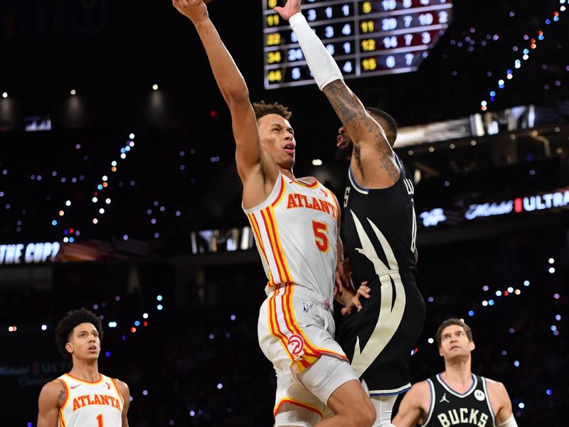 LAS VEGAS, NV - DECEMBER 14: Dyson Daniels #5 of the Atlanta Hawks drives to the basket during the game against the Milwaukee Bucks during the Emirates NBA Cup Semifinal game on December 14, 2024 at T-Mobile Arena in Las Vegas, Nevada. NOTE TO USER: User expressly acknowledges and agrees that, by downloading and/or using this Photograph, user is consenting to the terms and conditions of the Getty Images License Agreement. Mandatory Copyright Notice: Copyright 2024 NBAE (Photo by Juan Ocampo/NBAE via Getty Images)