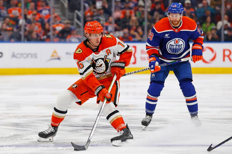 Jan 3, 2025; Edmonton, Alberta, CAN; Anaheim Ducks forward Ryan Strome (16) looks to pass in front of Edmonton Oilers forward Connor Brown (28) during the second period at Rogers Place. Mandatory Credit: Perry Nelson-Imagn Images