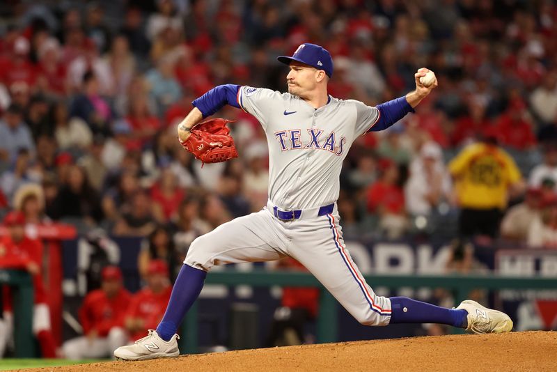 Sep 28, 2024; Anaheim, California, USA;  Texas Rangers starting pitcher Andrew Heaney (44) pitches during the first inning against the Los Angeles Angels at Angel Stadium. Mandatory Credit: Kiyoshi Mio-Imagn Images