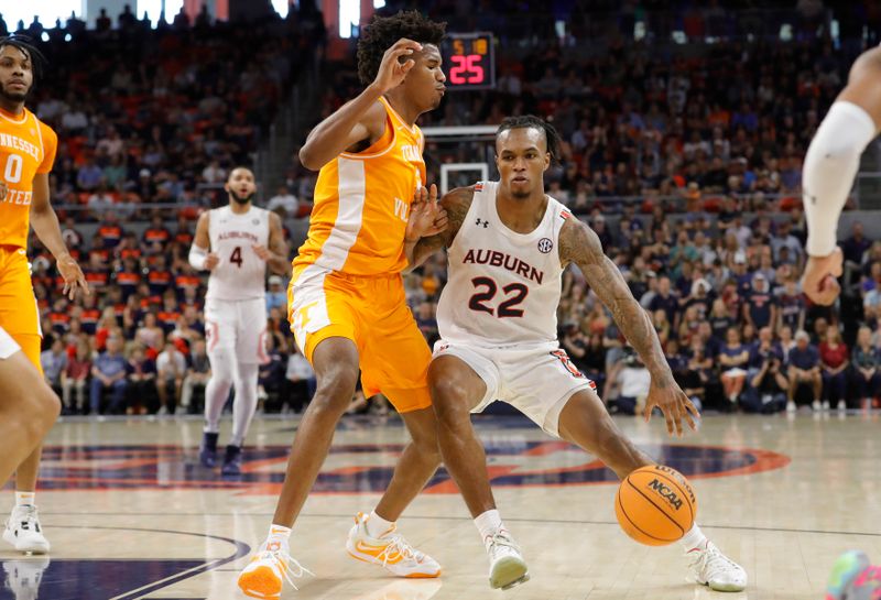 Mar 4, 2023; Auburn, Alabama, USA;  Tennessee Volunteers forward Julian Phillips (2) blocks Auburn Tigers guard Allen Flanigan (22) during the second half at Neville Arena. Mandatory Credit: John Reed-USA TODAY Sports