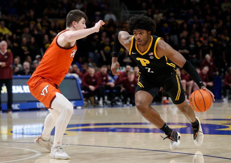 Feb 24, 2024; Pittsburgh, Pennsylvania, USA;  Pittsburgh Panthers forward Blake Hinson (2) drives to the basket against Virginia Tech Hokies guard Hunter Cattoor (left) during the second half at the Petersen Events Center. The Panthers won 79-64. Mandatory Credit: Charles LeClaire-USA TODAY Sports