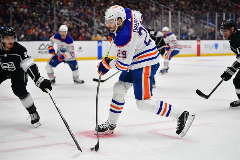 Dec 30, 2023; Los Angeles, California, USA; Edmonton Oilers center Leon Draisaitl (29) shoots on goal against the Los Angeles Kings during the first period at Crypto.com Arena. Mandatory Credit: Gary A. Vasquez-USA TODAY Sports