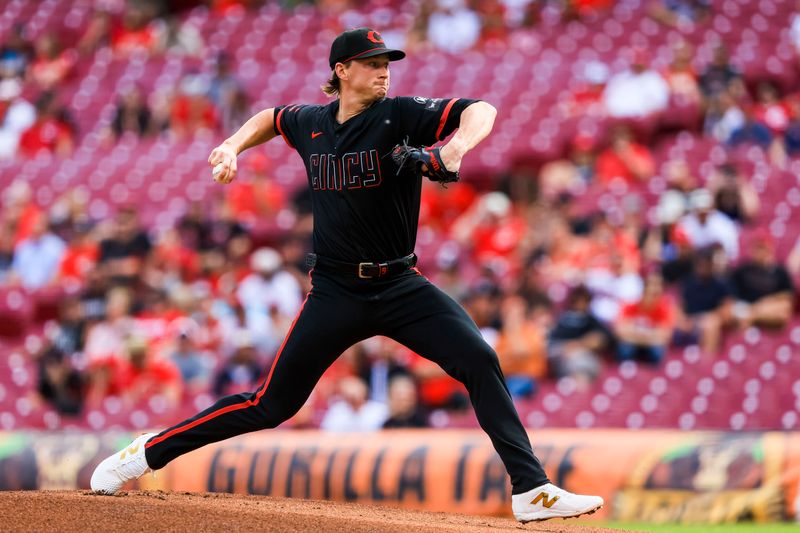 May 16, 2025; Cincinnati, Ohio, USA; Cincinnati Reds starting pitcher Brady Singer (51) pitches against the Cleveland Guardians in the first inning at Great American Ball Park. Mandatory Credit: Katie Stratman-Imagn Images