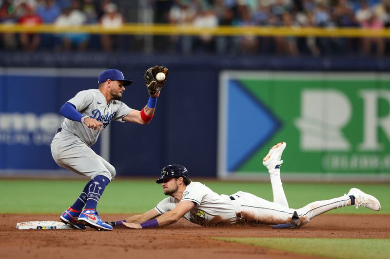 May 26, 2023; St. Petersburg, Florida, USA; Tampa Bay Rays designated hitter Josh Lowe (15) stars second base against the Los Angeles Dodgers in the first inning at Tropicana Field. Mandatory Credit: Nathan Ray Seebeck-USA TODAY Sports