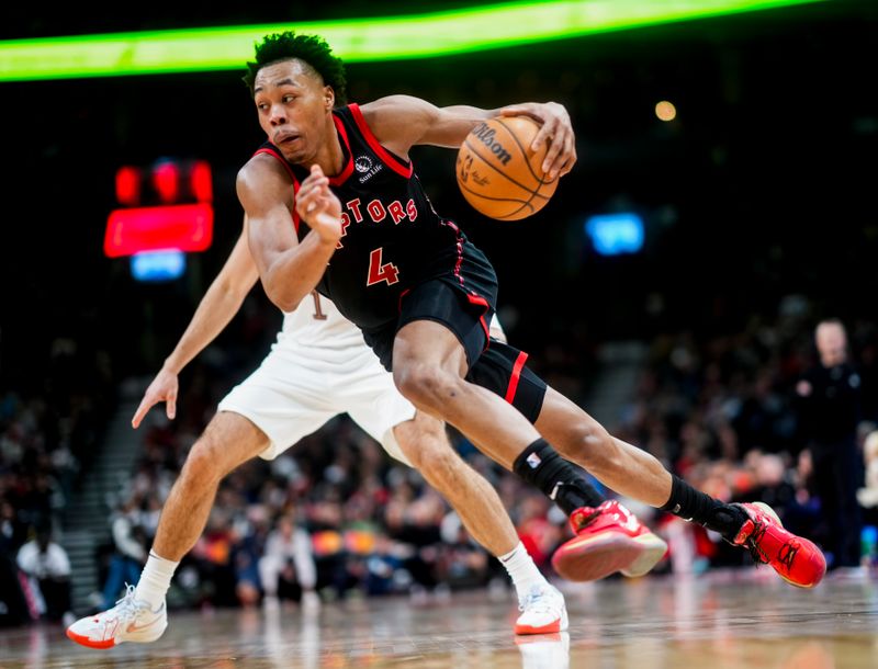 TORONTO, ON - FEBRUARY 10: Scottie Barnes #4 of the Toronto Raptors drives against the Cleveland Cavaliers during the second half of their basketball game at the Scotiabank Arena on February 10, 2024 in Toronto, Ontario, Canada. NOTE TO USER: User expressly acknowledges and agrees that, by downloading and/or using this Photograph, user is consenting to the terms and conditions of the Getty Images License Agreement. (Photo by Mark Blinch/Getty Images)