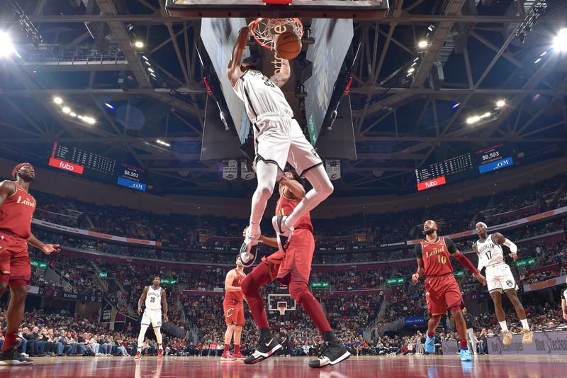 CLEVELAND, OH - MARCH 10: Nicolas Claxton #33 of the Brooklyn Nets dunks the ball during the game against the Cleveland Cavaliers on March 10, 2024 at Rocket Mortgage FieldHouse in Cleveland, Ohio. NOTE TO USER: User expressly acknowledges and agrees that, by downloading and/or using this Photograph, user is consenting to the terms and conditions of the Getty Images License Agreement. Mandatory Copyright Notice: Copyright 2024 NBAE (Photo by David Liam Kyle/NBAE via Getty Images)