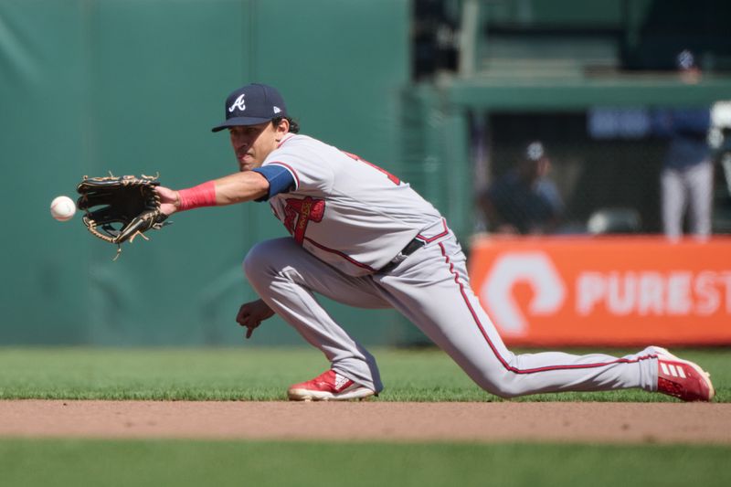 Aug 26, 2023; San Francisco, California, USA; Atlanta Braves infielder Nicky Lopez (15) fields a ground ball against the San Francisco Giants during the seventh inning at Oracle Park. Mandatory Credit: Robert Edwards-USA TODAY Sports