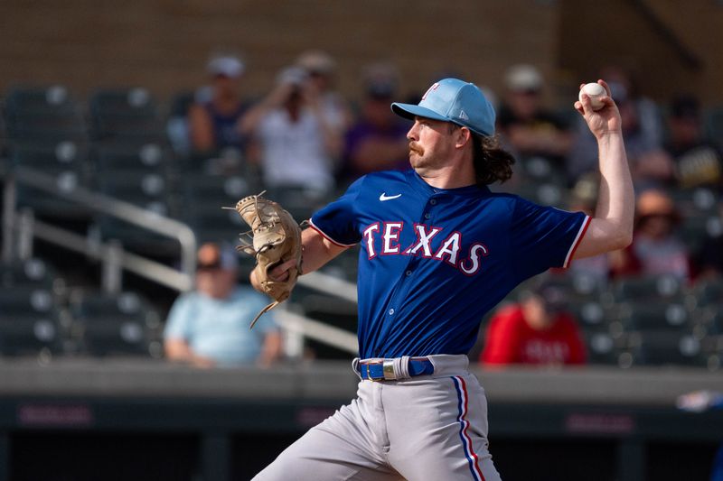 Mar 6, 2024; Salt River Pima-Maricopa, Arizona, USA; Texas Rangers pitcher Robbie Ahlstrom (60) pitches in the ninth during a spring training game against the Colorado Rockies at Salt River Fields at Talking Stick. Mandatory Credit: Allan Henry-USA TODAY Sports