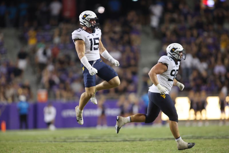 Sep 30, 2023; Fort Worth, Texas, USA; West Virginia Mountaineers linebacker Ben Cutter (15) reacts after a blocked field goal attempt in the fourth quarter by the TCU Horned Frogs at Amon G. Carter Stadium. Mandatory Credit: Tim Heitman-USA TODAY Sports