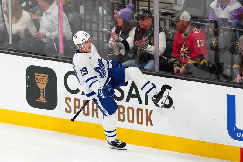 Feb 22, 2024; Las Vegas, Nevada, USA; Toronto Maple Leafs right wing Pontus Holmberg (29) celebrates after scoring a goal against the Vegas Golden Knights during the second period at T-Mobile Arena. Mandatory Credit: Stephen R. Sylvanie-USA TODAY Sports