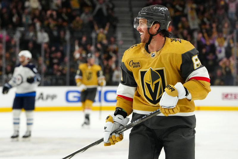 Nov 2, 2023; Las Vegas, Nevada, USA; Vegas Golden Knights right wing Jonathan Marchessault (81) celebrates after scoring his third goal of the game against the Winnipeg Jets during the third period at T-Mobile Arena. Mandatory Credit: Stephen R. Sylvanie-USA TODAY Sports