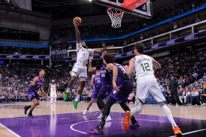 SACRAMENTO, CA - MARCH 12: Thanasis Antetokounmpo #43 of the Milwaukee Bucks drives to the basket during the game against the Sacramento Kings on March 12, 2024 at Golden 1 Center in Sacramento, California. NOTE TO USER: User expressly acknowledges and agrees that, by downloading and or using this Photograph, user is consenting to the terms and conditions of the Getty Images License Agreement. Mandatory Copyright Notice: Copyright 2024 NBAE (Photo by Rocky Widner/NBAE via Getty Images)