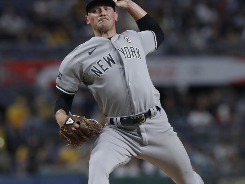 Sep 15, 2023; Pittsburgh, Pennsylvania, USA;  New York Yankees relief pitcher Anthony Misiewicz (54) pitches against the Pittsburgh Pirates during the sixth inning at PNC Park. Mandatory Credit: Charles LeClaire-USA TODAY Sports