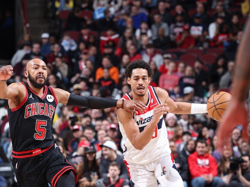 CHICAGO, IL - MARCH 25:  Jordan Poole #13 of the Washington Wizards dribbles the ball during the game against the Chicago Bulls on March 25, 2024 at United Center in Chicago, Illinois. NOTE TO USER: User expressly acknowledges and agrees that, by downloading and or using this photograph, User is consenting to the terms and conditions of the Getty Images License Agreement. Mandatory Copyright Notice: Copyright 2024 NBAE (Photo by Jeff Haynes/NBAE via Getty Images)