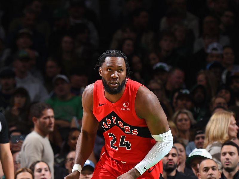 BOSTON, MA - NOVEMBER 16: Bruno Fernando #24 of the Toronto Raptors looks on during the game against the Boston Celtics on November 16, 2024 at TD Garden in Boston, Massachusetts. NOTE TO USER: User expressly acknowledges and agrees that, by downloading and/or using this Photograph, user is consenting to the terms and conditions of the Getty Images License Agreement. Mandatory Copyright Notice: Copyright 2024 NBAE (Photo by Brian Babineau/NBAE via Getty Images)