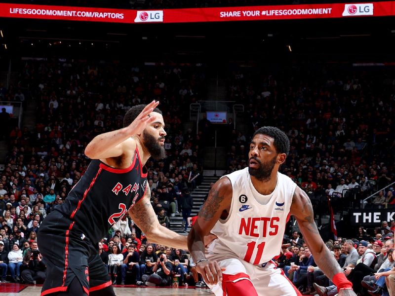 TORONTO, CANADA - DECEMBER 16: Kyrie Irving #11 of the Brooklyn Nets handles the ball during the game against the Toronto Raptors on December 16, 2022 at the Scotiabank Arena in Toronto, Ontario, Canada.  NOTE TO USER: User expressly acknowledges and agrees that, by downloading and or using this Photograph, user is consenting to the terms and conditions of the Getty Images License Agreement.  Mandatory Copyright Notice: Copyright 2022 NBAE (Photo by Vaughn Ridley/NBAE via Getty Images)