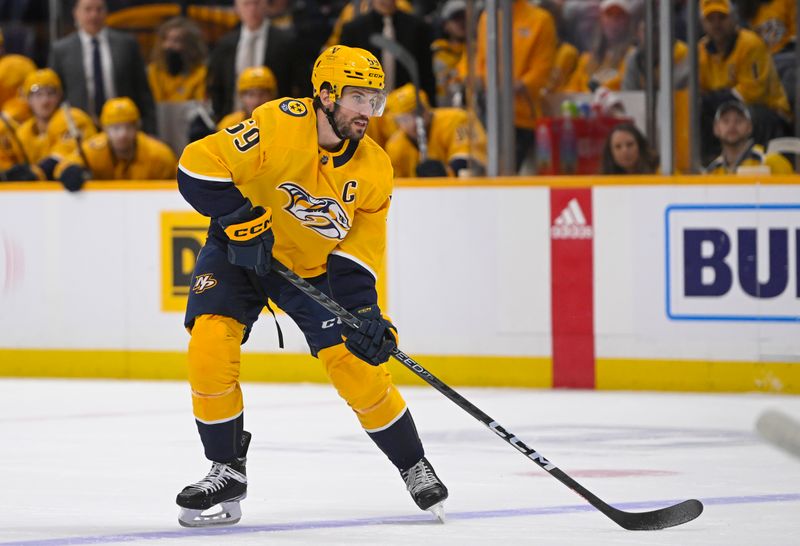 Jan 17, 2023; Nashville, Tennessee, USA;  Nashville Predators defenseman Roman Josi (59) skates against the Columbus Blue Jackets during the first period at Bridgestone Arena. Mandatory Credit: Steve Roberts-USA TODAY Sports