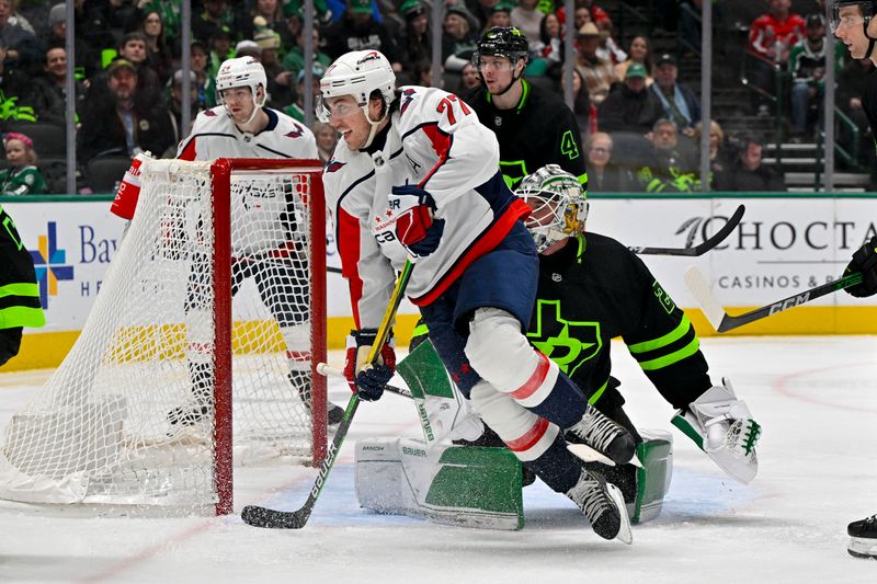 Jan 27, 2024; Dallas, Texas, USA; Washington Capitals right wing T.J. Oshie (77) skates past Dallas Stars goaltender Jake Oettinger (29) during the third period at the American Airlines Center. Mandatory Credit: Jerome Miron-USA TODAY Sports