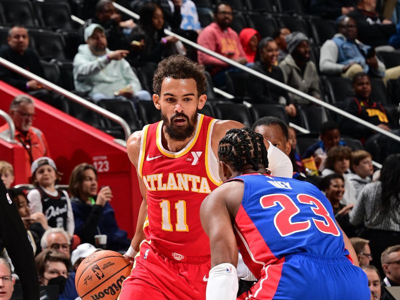 DETROIT, MI - NOVEMBER 8: Trae Young #11 of the Atlanta Hawks dribbles the ball during the game against the Detroit Pistons on November  8, 2024 at Little Caesars Arena in Detroit, Michigan. NOTE TO USER: User expressly acknowledges and agrees that, by downloading and/or using this photograph, User is consenting to the terms and conditions of the Getty Images License Agreement. Mandatory Copyright Notice: Copyright 2024 NBAE (Photo by Chris Schwegler/NBAE via Getty Images)