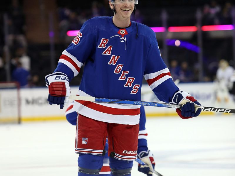 Nov 25, 2023; New York, New York, USA; New York Rangers left wing Jimmy Vesey (26) smiles before the first period against the Boston Bruins at Madison Square Garden. Mandatory Credit: Danny Wild-USA TODAY Sports