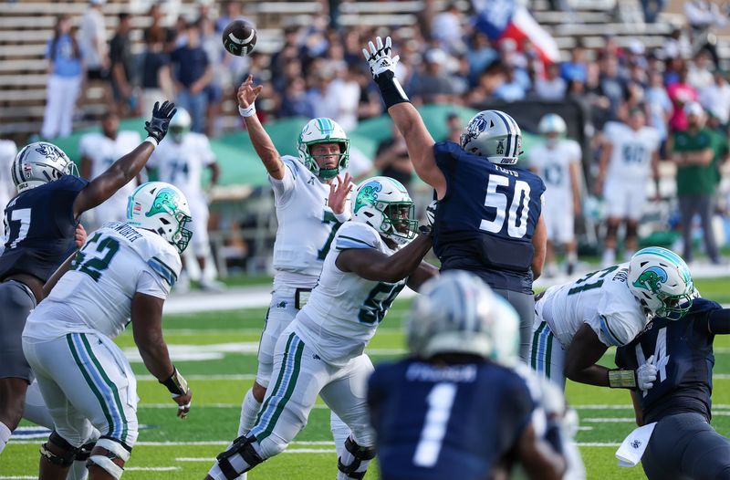 Oct 28, 2023; Houston, Texas, USA; Tulane Green Wave quarterback Michael Pratt (7) throws a pass against the Rice Owls in the first half at Rice Stadium. Mandatory Credit: Thomas Shea-USA TODAY Sports