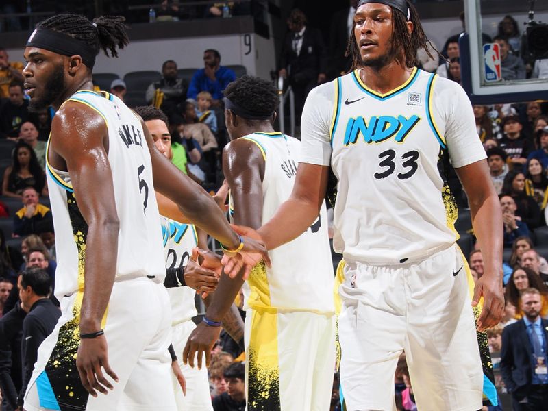 INDIANAPOLIS, IN - NOVEMBER 17: Jarace Walker #5 and Myles Turner #33 of the Indiana Pacers high five during the game against the Miami Heat on November 17, 2024 at Gainbridge Fieldhouse in Indianapolis, Indiana. NOTE TO USER: User expressly acknowledges and agrees that, by downloading and or using this Photograph, user is consenting to the terms and conditions of the Getty Images License Agreement. Mandatory Copyright Notice: Copyright 2024 NBAE (Photo by Ron Hoskins/NBAE via Getty Images)