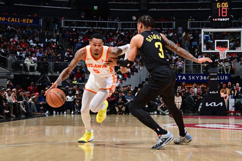 ATLANTA, GA - FEBRUARY 27: Dejounte Murray #5 of the Atlanta Hawks dribbles the ball during the game against the Utah Jazz  on February 27, 2024 at State Farm Arena in Atlanta, Georgia.  NOTE TO USER: User expressly acknowledges and agrees that, by downloading and/or using this Photograph, user is consenting to the terms and conditions of the Getty Images License Agreement. Mandatory Copyright Notice: Copyright 2024 NBAE (Photo by Scott Cunningham/NBAE via Getty Images)