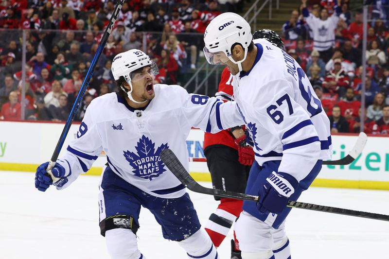 Oct 10, 2024; Newark, New Jersey, USA; Toronto Maple Leafs left wing Max Pacioretty (67) celebrates his goal against the New Jersey Devils during the first period at Prudential Center. Mandatory Credit: Ed Mulholland-Imagn Images