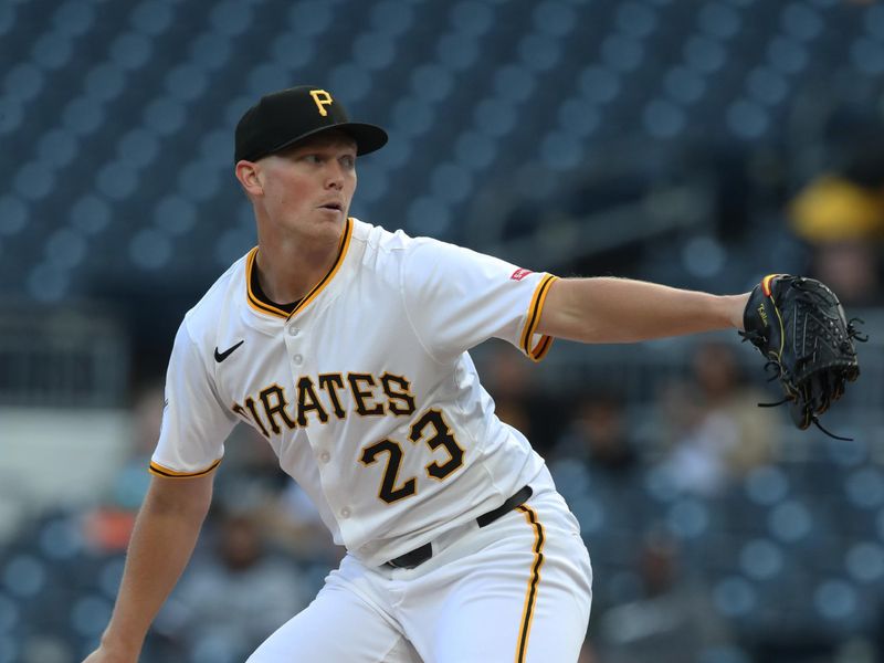 May 19, 2025; Pittsburgh, Pennsylvania, USA;  Pittsburgh Pirates starting pitcher Mitch Keller (23) delivers a pitch against the Cincinnati Reds during the first inning at PNC Park. Mandatory Credit: Charles LeClaire-Imagn Images